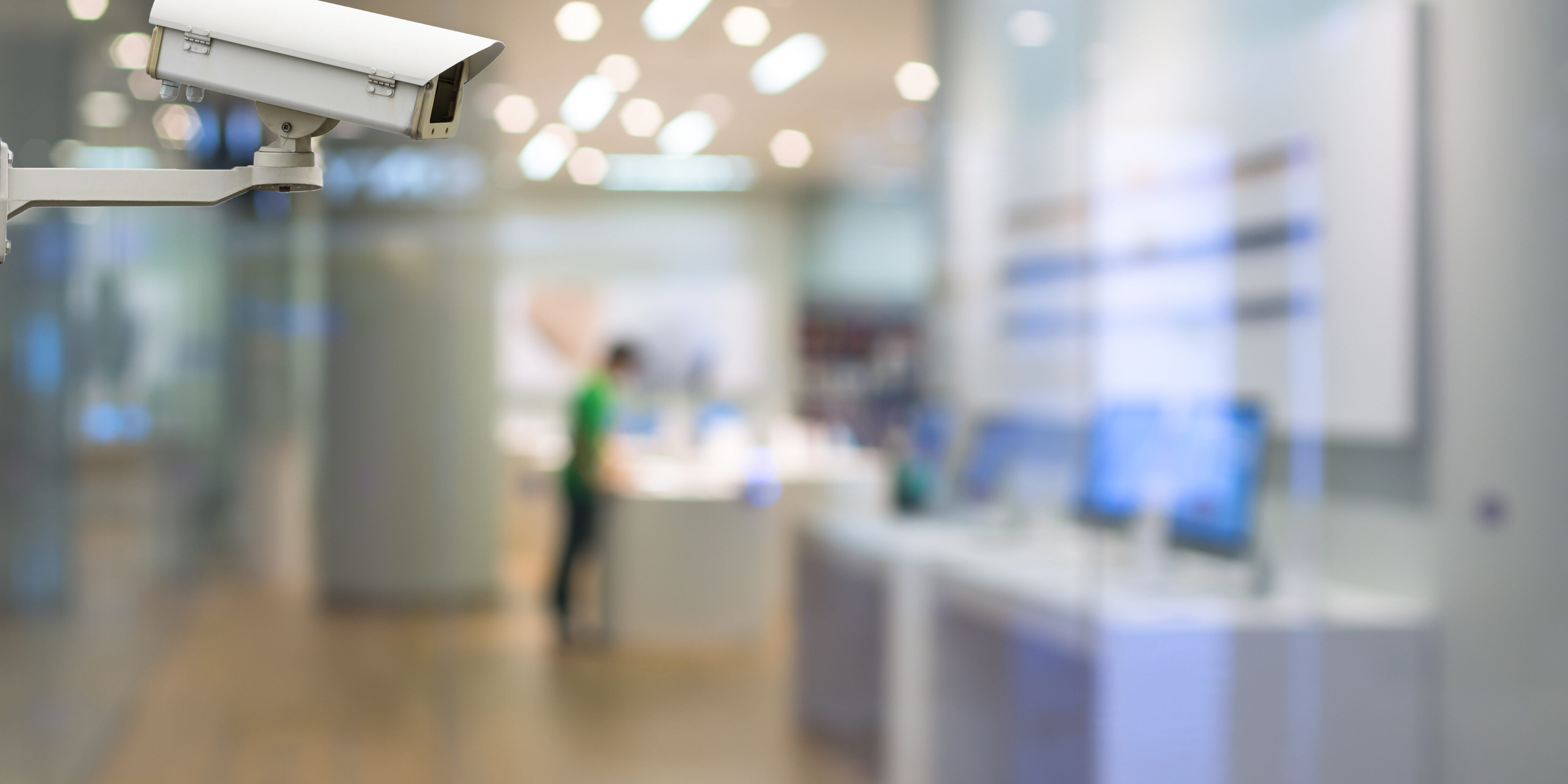 CCTV security camera on monitor the abstract store blurred in ha