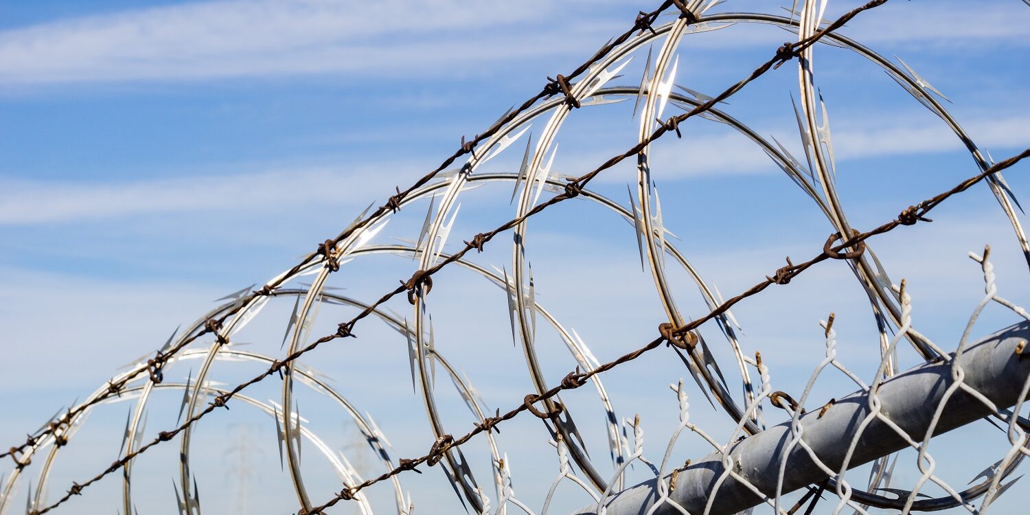 Razor barbed wire security fence, California