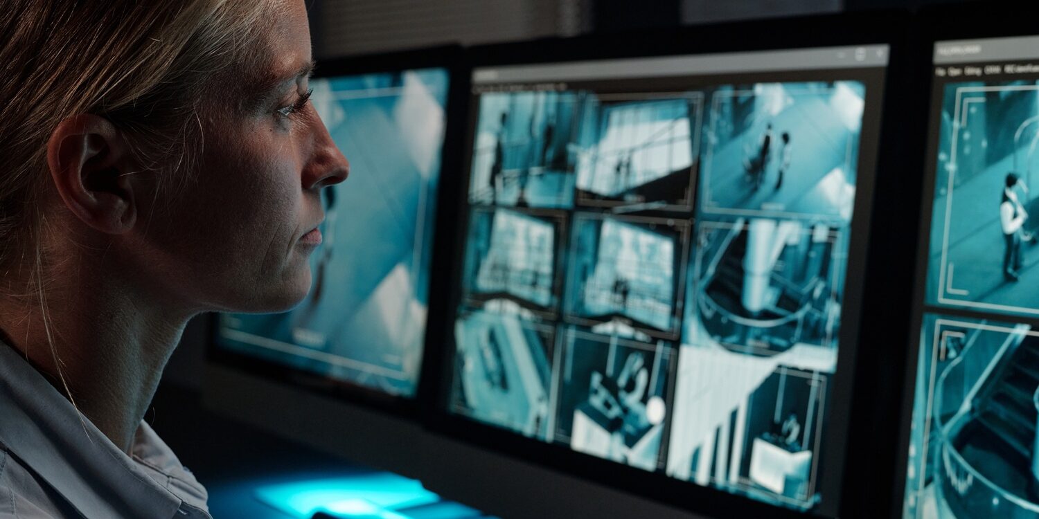 Female guard sitting by workplace